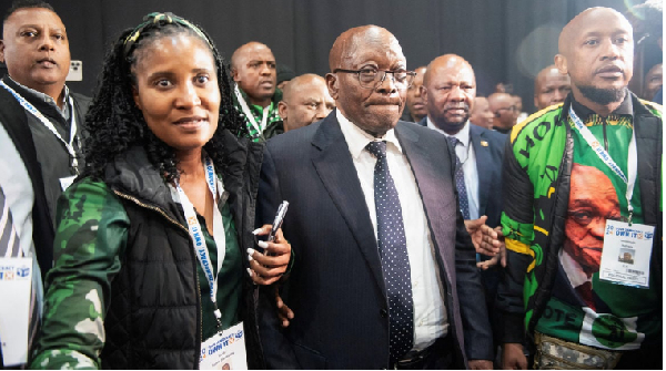 South Africa's former President Jacob Zuma arrives with his daughter and member of uMkhonto weSizwe