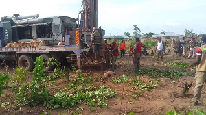 Famers and beneficiaries on a farmland