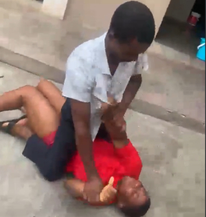 The Teacher Is Seen Engaging In A Physical Struggle With The Student.png
