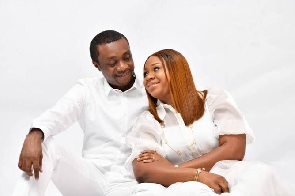 A file photo of Nathaniel Bassey and wife
