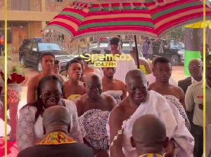 Otumfuo Osei Tutu II with his wife, Lady Julia exchanging pleasantries with the clergymen