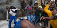 A picture of some South Africans attacking citizens of other nations