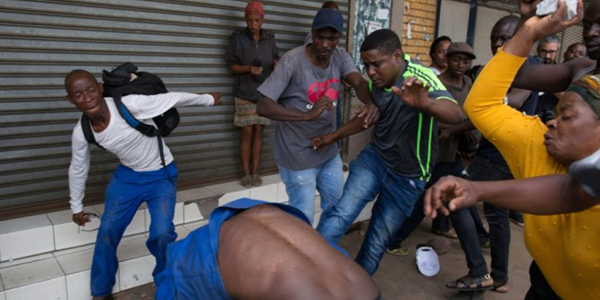 A picture of some South Africans attacking citizens of other nations