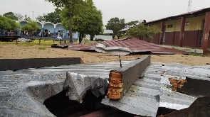 The damaged roof of a school lies in the playground in Vilanculos, Mozambique, on Feb. 24, 2023