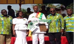 President Mahama in a pose with the National Best farmer, Mr Crentsil