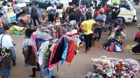Traders takeover pavements at the Lapaz stretch of the N1 Highway to ply their trade