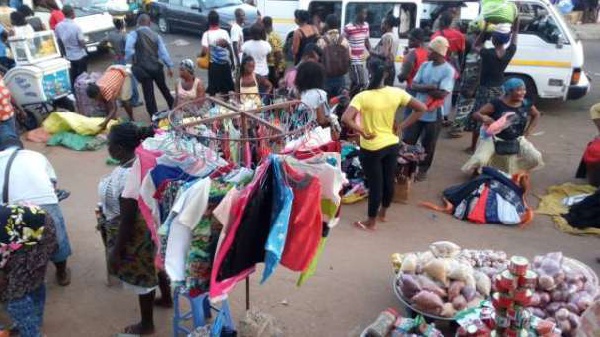 Traders takeover pavements at the Lapaz stretch of the N1 Highway to ply their trade