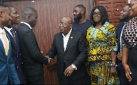 Akufo-Addo interacting with NUGS president Dennis Appiah Larbi-Ampofo (third from left)