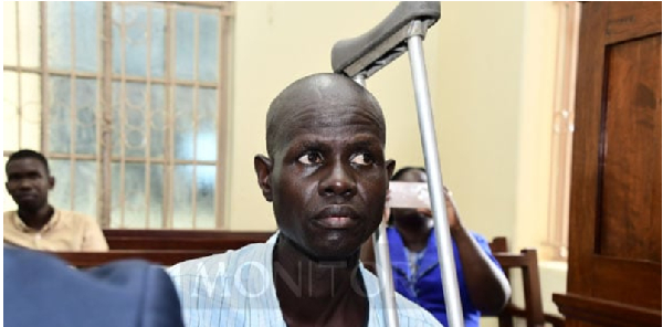 Inspector of Police (IP) Emmanuel Abura Wilson looks on during proceedings