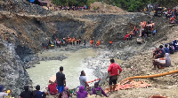 Rescue efforts continue after a landslide traps dozens at an illegal gold miners
