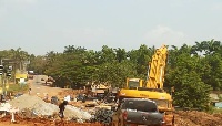 A contractor working on site at the bridge