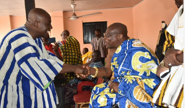 Dan Botwe (L) made the presentation at a durbar of the chiefs and people of Okere