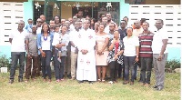 GPHA in a group photograph with staff of St. Vincent De Paul Society