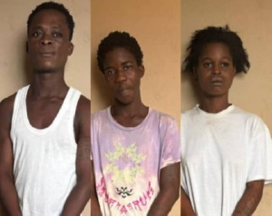 A photo of the three jailed for 19 years in total over phone theft