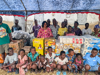 Some of the beneficiaries with the doners in a photograph