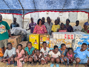 Some of the beneficiaries with the doners in a photograph