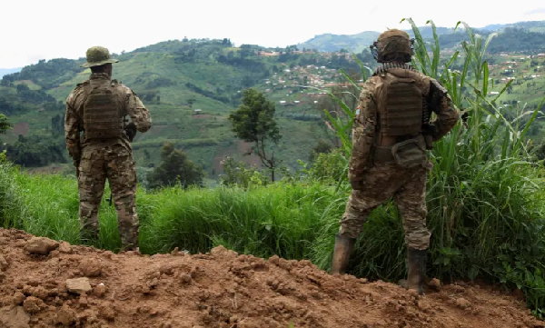 Members of the Armed Forces of the DRC  stand guard against the M23 rebel group