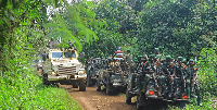 DR Congo soldiers and UN forces patrol near Oicha after attack