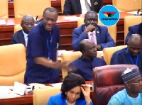 Adwoa Safo fixing her wig in parliament