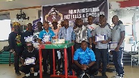 The President of GAF in a group photo with some executives and referees