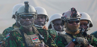 Members of the first contingent of Kenyan police stand in formation after arriving in the Caribbean