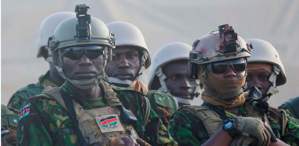 Members of the first contingent of Kenyan police stand in formation after arriving in the Caribbean