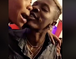 Shatta Wale locked lips with the unknown woman in a viral video