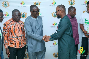 Osman Ayariga of the NYA (R) in a handshake with Prof Kwabena Biritwum of the KNUST