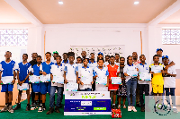 Some of the participants with the organizers in a group photo