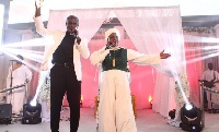 Uncle Ato with Ohemaa Mercy on stage