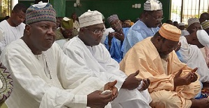 Bawumia and late former Veep Aliu Mahama praying together