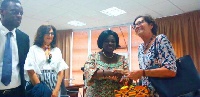 Cecilia Dapaah (2 right) presents a gift to Ms Maria Alonso, the Spanish Ambassador to Ghana