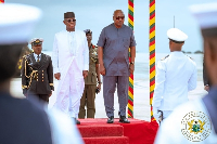 Sierra Leone's President (L) Julius Bio with Ghana's John Dramani Mahama