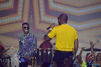 Wizkid and Davido performing on stage