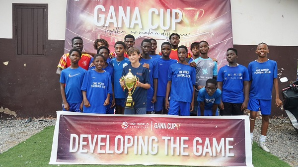 The winning team holding the GANA trophy
