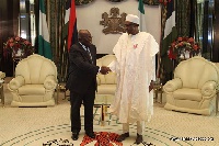President-elect Nana Akufo-Addo exchange pleasantries with President Muhammadu Buhari