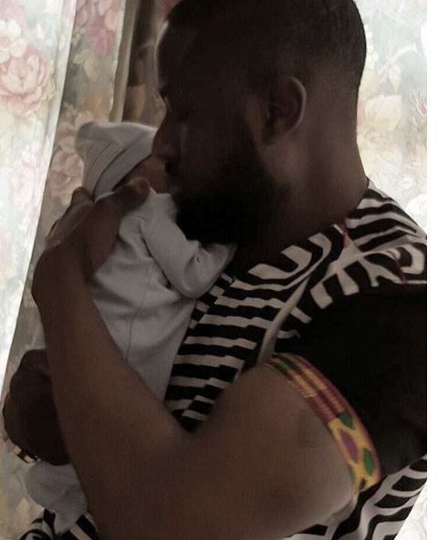 Elikem Kumordzi with his daughter