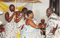 Nanahemaa Akosua Kusiwaa I in a handshake at the function