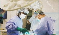 Surgeons performing a surgery