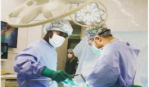 Surgeons performing a surgery
