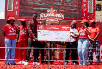 Winner Daniel Asante receiving his prize at the ceremony