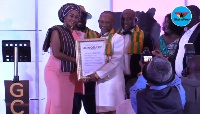 Fadda Dickson receiving his award