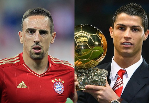 Ex-Bayern Munich star Franck Ribery (L) and Cristiano Ronaldo (R) holding the 2013 Ballon d'Or