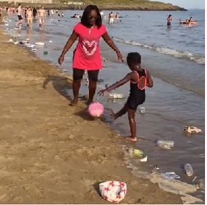 Emelia Brobbey with daughter at Barry Island beach