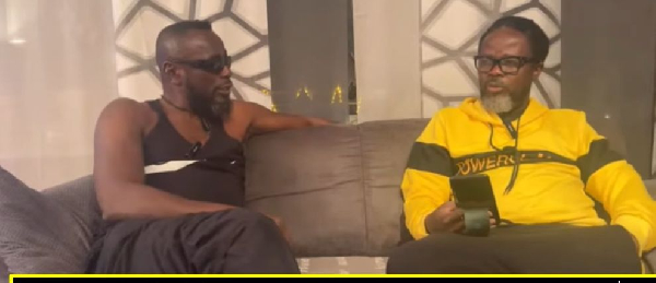 Isaac Otoo sitting with Dan Kwaku Yeboah during the interview