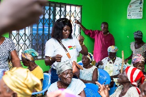 Founder of KinderHilfe Ghana, Evelyn Groeling interacting with some of the widows