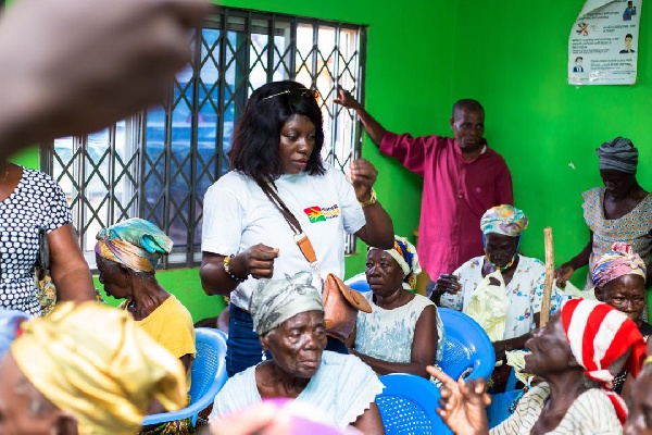 Founder of KinderHilfe Ghana, Evelyn Groeling interacting with some of the widows