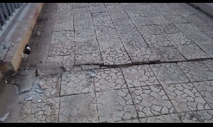 Parts of the footbridge has shifted with visible cracks seen on the floor of the bridge
