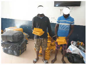 The two suspects who have been arrested with 519 parcels of suspected Indian hemp