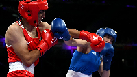 Alleged trans boxer Imane Khelif (red) and Italian female boxer Angela Carini (blue)